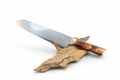 Feather blade chef knife with a wooden handle on a white background